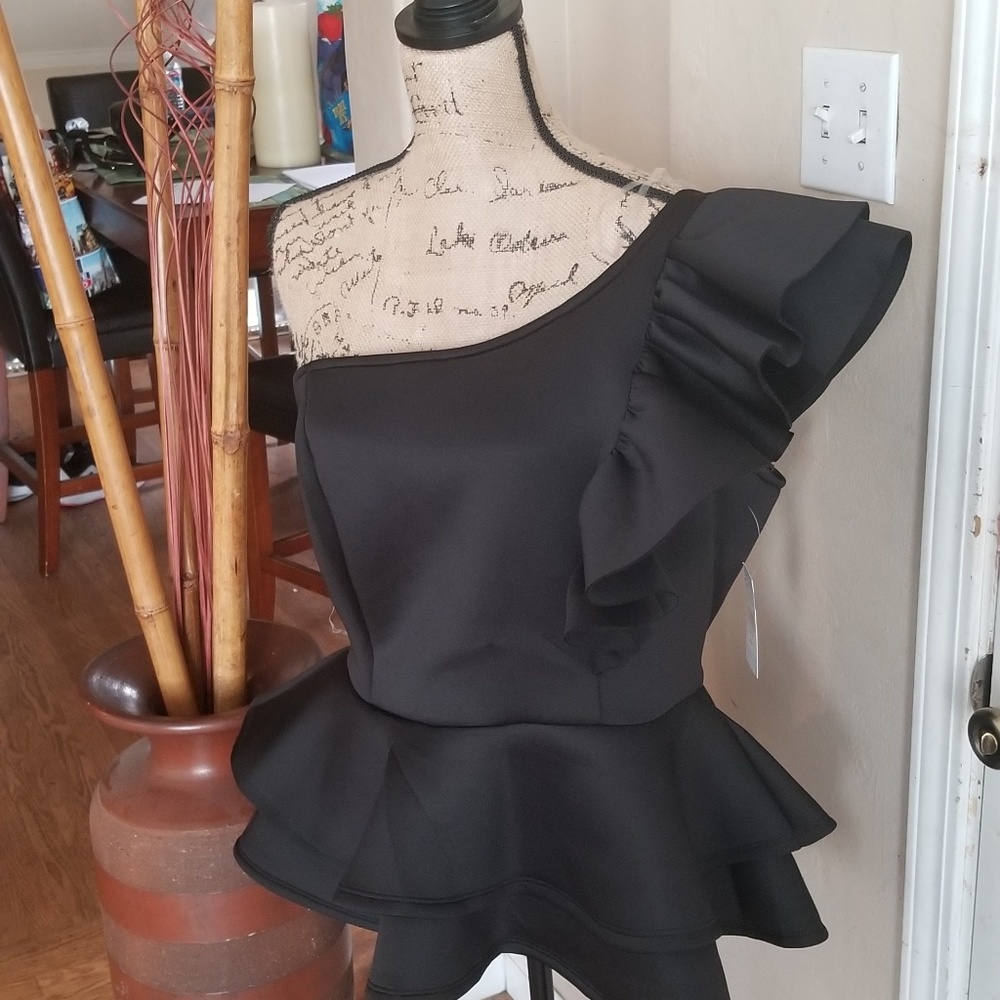 Ruffled one shoulder peplum blouse